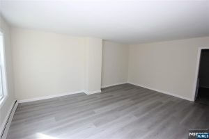 Empty bedroom with gray floors