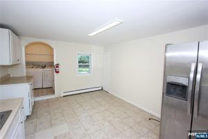 Kitchen with arched pantry nook